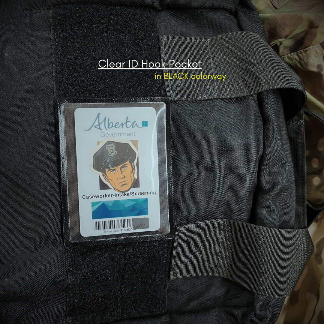 Clear ID hook pocket on a black bag with an government ID card displayed.