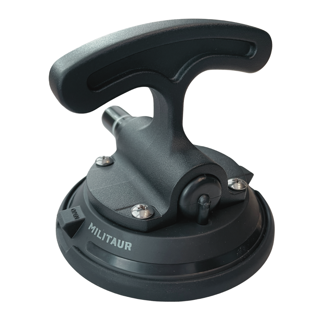 the Militaur black suction cup tool with handle on a white background, to hold gear and equipment