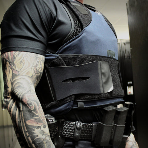 strong police wearing a militaur ventilation vest under internal carrier